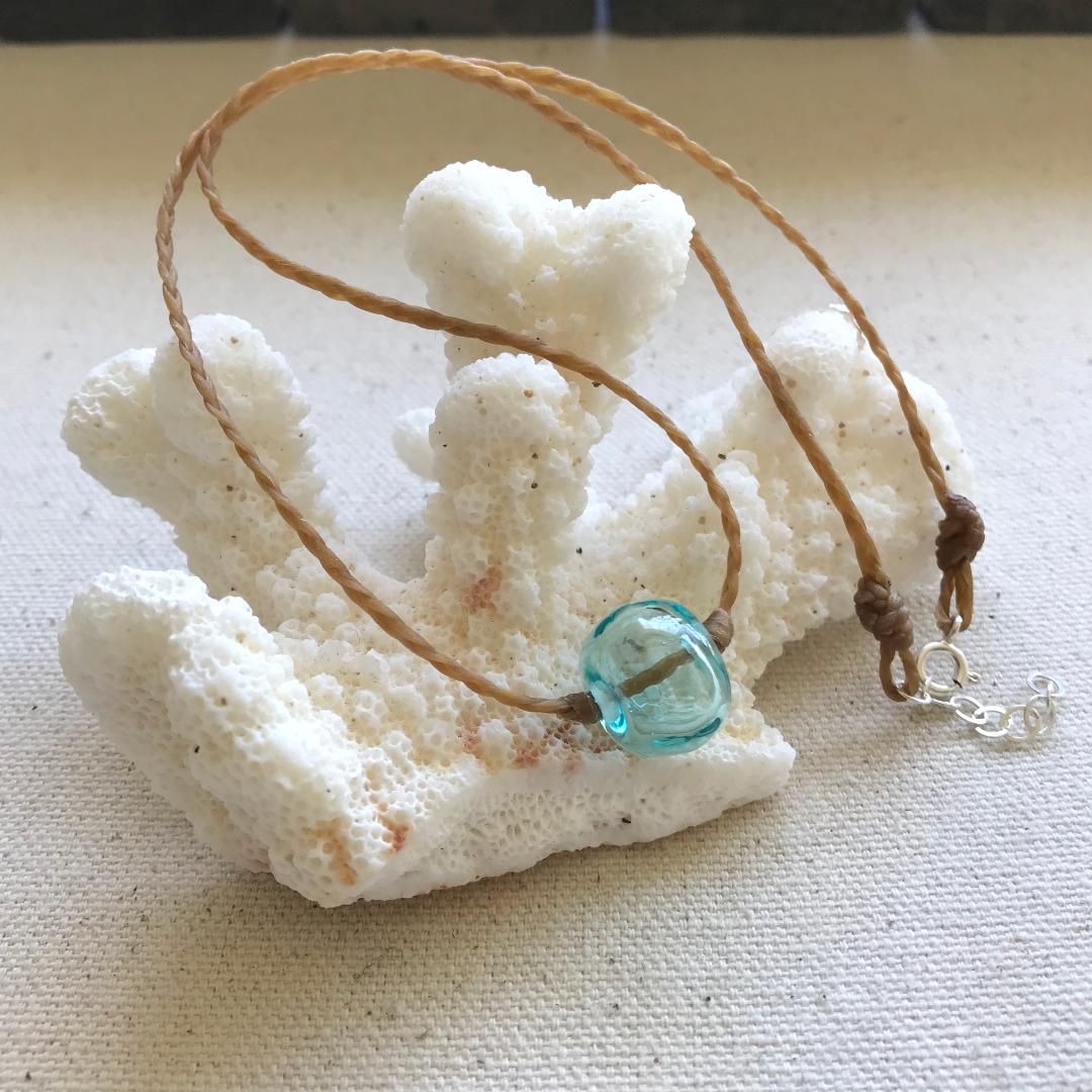 Braided Waxed Cord Beach necklace with Handmade Hollow Aqua Glass Bead