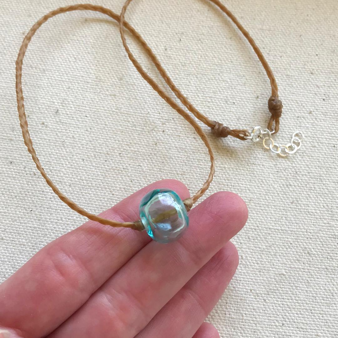 Braided Waxed Cord Beach necklace with Handmade Hollow Aqua Glass Bead