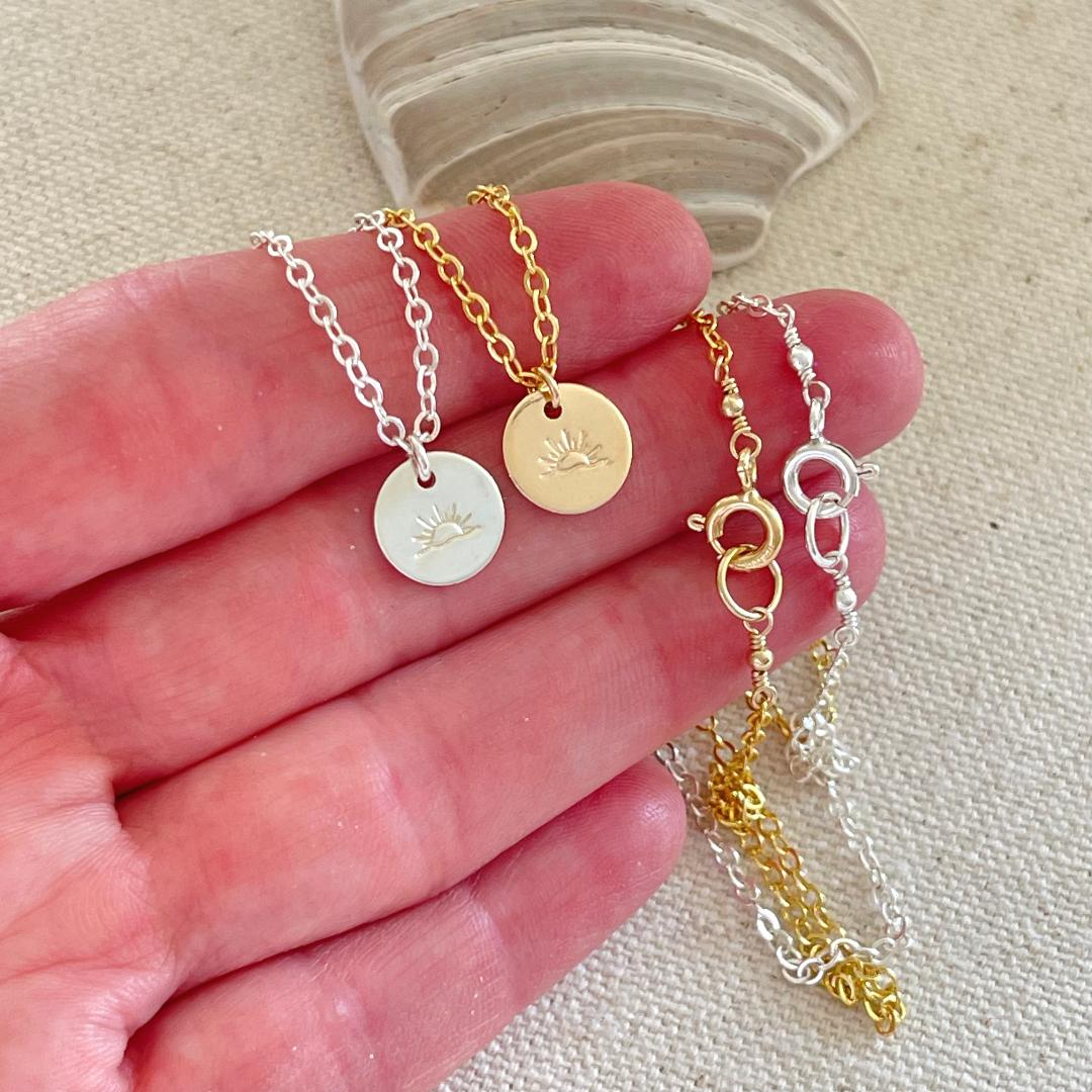 Hand stamped ocean sunset on either sterling silver or 14 goldfilled 9.5mm disc on sterling silver or 14K gold-filled chain in your choice of length.